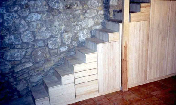 Staircase with an integrated wardrobe